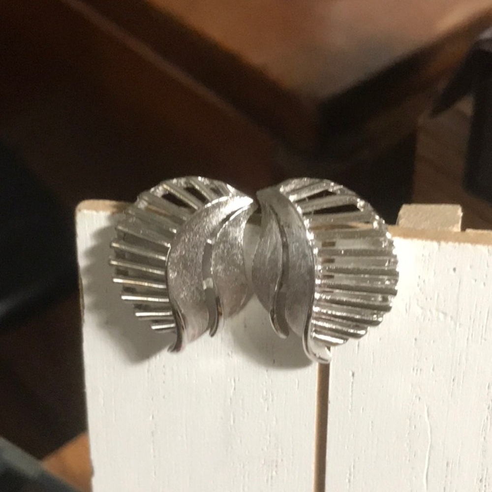 Vintage crown, Trifari silver tone clip on leaf wave design earrings